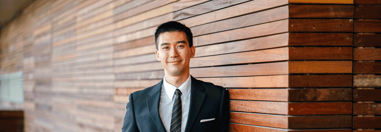 Man standing and smiling