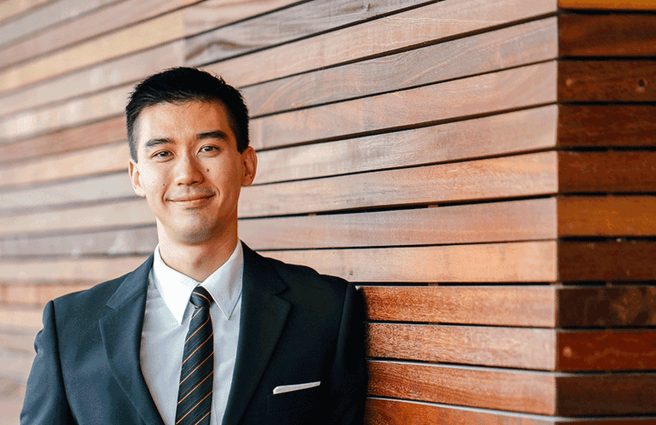 Man standing and smiling
